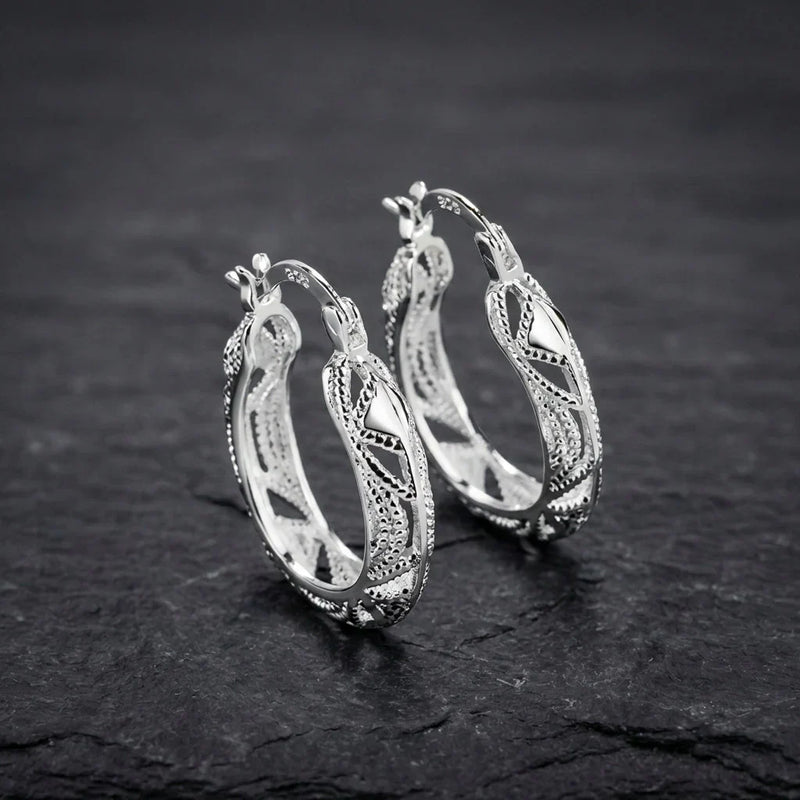 Elegant Carved Silver Earrings
