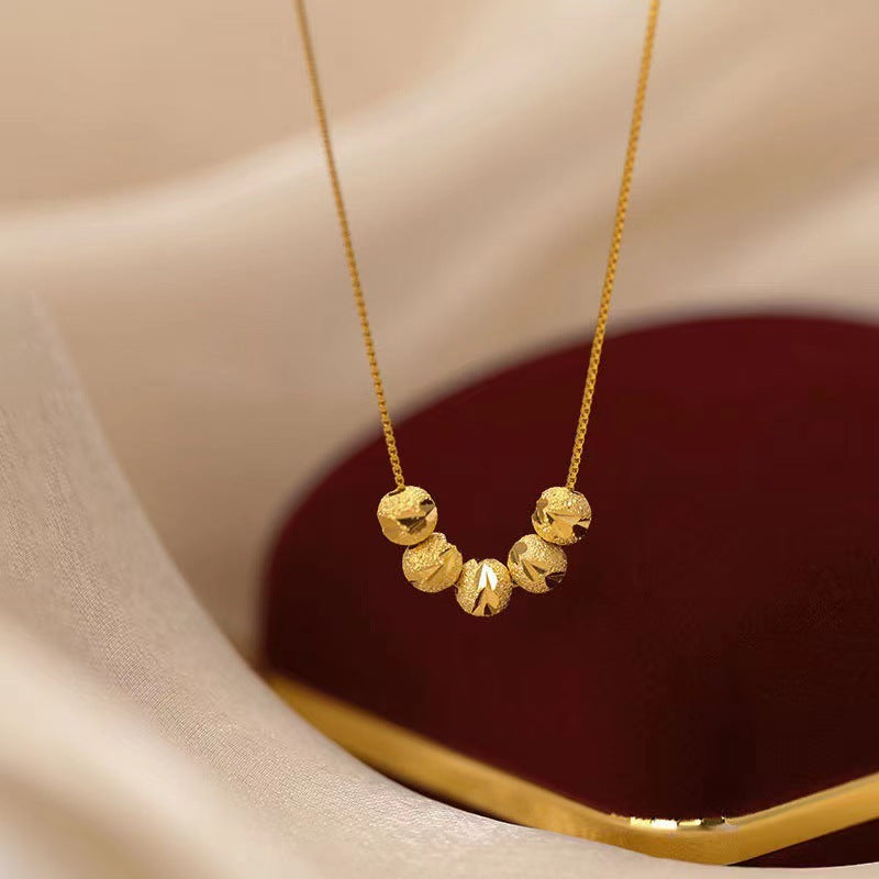 Elegant Gold Beaded Necklace