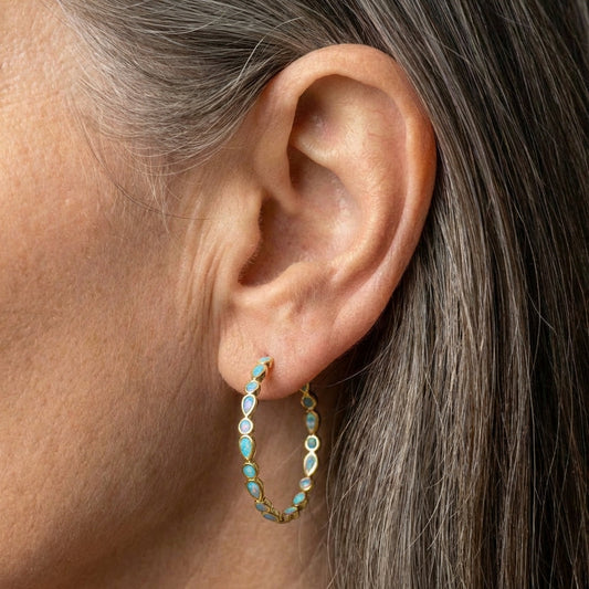 A Blue Opal Gold Earring Set