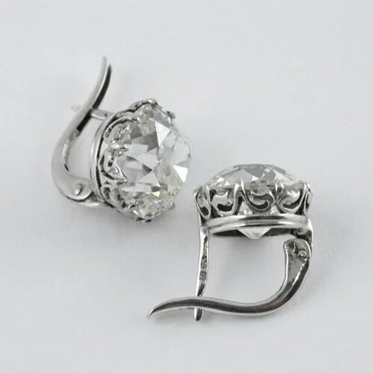 1+1 Offer: Layered Zirconia Ring + Zirconia Silver Earrings