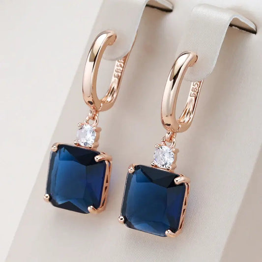 Earrings With Dark Blue Crystal in Gold