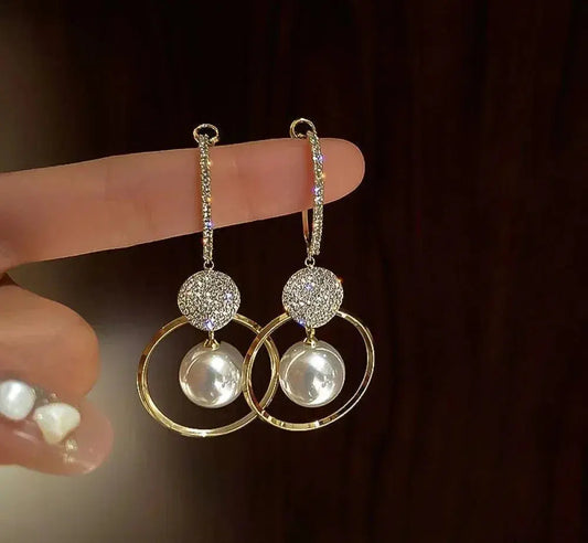 Earrings With Cultured Pearls and Zircons